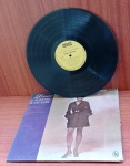 Disco de Vinil com marcas do tempo.