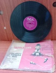 Disco de Vinil com marcas do tempo.