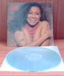 Disco de Vinil com marcas do tempo.
