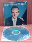 Disco de Vinil com marcas do tempo.