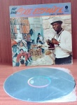 Disco de Vinil com marcas do tempo.