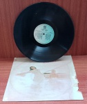 Disco de Vinil com marcas do tempo.