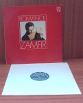Disco de Vinil com marcas do tempo.