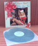 Disco de Vinil com marcas do tempo.