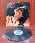 Disco de Coleção com marcas do tempo.