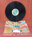 Disco de Coleção com marcas do tempo.