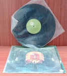 Disco de Coleção com marcas do tempo.