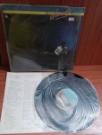 Disco de Coleção com marcas do tempo.
