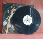 Disco de Coleção com marcas do tempo.