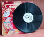 Disco de Coleção com marcas do tempo.