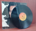 Disco de Coleção com marcas do tempo.