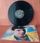 Disco de Coleção com marcas do tempo.