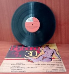 Disco de Coleção com marcas do tempo.