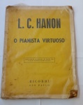 Partitura Antiga O Pianista Virtuoso com desgastes do uso