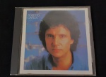 CD com Trincado em sua capa com marcas do tempo.