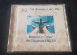 CD Os Amores Do Rio Banda  e Coral Do Sistema Firjan Marcas do tempo Em sua Capa.
