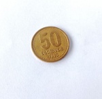 Moeda De Colecionismo com Marcas do tempo.