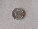 Moeda De Colecionismo com Marcas do tempo.