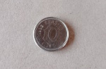Moeda De Colecionismo com Marcas do tempo.