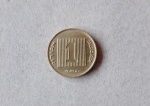 Moeda De Colecionismo com Marcas do tempo.