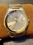 BULOVA - Relógio Quartz, todo em aço com detalhes folheado a ouro, excelente estado
