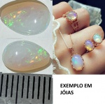 OPALA - GEMA BÉLISSIMA COM LAPIDAÇÃO  GOTA    COM COR PÉROLA E DEZENAS DE PONTOS AZUIS , VERMELHOS A
