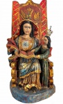 MINAS SÉC. XIX - Magnifica e rara imagem sacra de SANT'ANNA, esculpida em madeira com fabulosa policromia, portando coroas de metal. Minas meados séc. XIX. Mede 85 x 45cm.