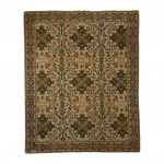 CASA CAIADA - Imponente tapete feito à mão adornado com flores policromadas, assinado e datado no verso CASA CAIADA 1984 MADRESSILVA. No estado. Mede 1,62 x 1,35cm.