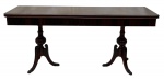 DONA MARIA - Aparador / mesa de jantar com estrutura em jacarandá, pés torneados ao estilo e período Dona Maria I com acabamento em garras de metal, tampo dobrável para ser usada como aparador e ou mesa, frente sanfona composta de duas gavetas. Medida aberta 100 x 1,80cm x 78cm altura.