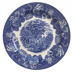 ENGLAND WOOD'S ENOCH 1784 - Prato raso em faiança inglesa adornada com "fazendinha" e motivo floral na borda sobre cor azul. Formato ovalado. Registro WOODS ENOCH 1784 ENGLISH SCENERY. Mede 25 cm.