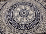 Duas toalhas de mesa , sem uso , ambas Paquistanesas : uma azul com figuras de elefantes /cavalos/ pavões medindo 240 x 215 cm e outra nos tons preta e bege com apresentação de grandes elefantes  medindo 235 x 214 cm.
