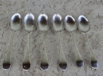 Seis colheres médias em metal espessurado a prata .Com contraste de procedência europeia. Mede 17 cm.
