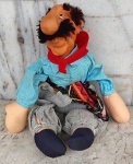 Boneco Gaúcho com roupa e acessório típico da cultura do Rio Grande do Sul . Rosto em borracha . Comprimento 38 cm.
