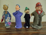 Quatro MARIONETES  em borracha  representando personagens infantis medindo 30 a 38 cm.