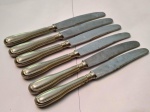 Conjunto de SEIS FACAS PRINCIPAIS  todas com a marca ALPACA e lâminas inox .Todas as peças estão  em  perfeitas condições . Medem 24 cm.