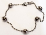 Pulseira produzida em prata de lei contraste de teor 925ml, corrente modelo bolinha, comprimento aberto:18,5cm.