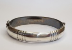 Belíssima pulseira produzida em prata de lei, estiloso designb, maior comprimento:6,5cm.