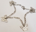 Pulseira produzida em prata de lei, com representação de B17cm.orboleta, comprimento aberto:17,2cm.