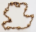 Bela pulseira infantil produzida em Ouro 18K, corrente modelo bolinha, maior comprimento:13cm peso:0,9gr.