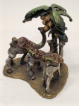 Porta joias camelos sob uma palmeira,