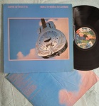 LP DIRE STRAITS - BROTHERS IN ARMS C/ ENCARTE // CAPA CONFORME FOTOS // DISCO EM MUITO BOM ESTADO // PODE CONTER RISCOS QUE CAUSAM CHIADOS, RUÍDOS OU PULOS