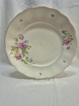 Travessa redonda em porcelana polonesa floral com friso ouro. Medindo 32cm de diâmetro.
