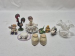 Miniaturas - Lote de 10 enfeites em materiais diversos, sendo porcelana, metal e plastico. Medindo o maior 7,5cm de altura.