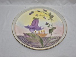 Prato de bolo decorativo em porcelana com pintura de tulipa. Medindo 34,5cm de diâmetro.