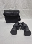 Binoculos da marca Bushnell. Medindo 17cm x 19cm.