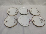 Lote de 6 pires de chá em porcelana floral. Medindo 14,5cm de diâmetro.