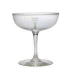 IMPERIO BRASILEIRO. BARÃO DO IBIROCAI  Taça para champagne em cristal translucido pertencente ao Primeiro e único Serviço do Barão de Ibirocaí (Luís de Freitas Vale). Bojo liso apresentando a inicial encimado por coroa. 10 cm.