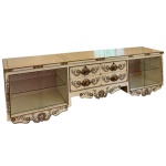 DINUCCI, Salvatore  Aparador suspenso de formato retangular. Desenho decorativo sobre pátina bege utilizando elementos naturais e representativos, em dourado antigo. São Paulo. Anos 1950. Este lote encontra-se em HIGIENOPOLIS, SP. Retirada com agendamento antecipado em nosso Escritório do Leilão 11.5044.1228.