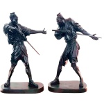 Raro e magnífico par de grandes esculturas de bronze patinado de excepcional fundição, na figura de