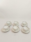 JOGO DE 6 XÍCARAS DE CAFÉ EM PORCELANA BRANCA RENNER PORTO ALEGRE COM FRISO PRATA E DECORAÇÃO DE RAMOS DE FLORES. MEDIDA: XÍCARA 6,5 CM D X 4,5  CM DE ALTURA, PIRES 10,5 CM